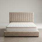 Beige bed with tufted headboard and mattress on a plain background