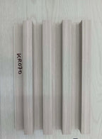 Wooden panel with a textured finish on a light gray background