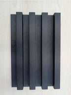 Set of black rectangular blocks on a light gray background