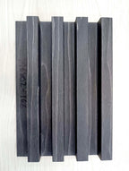 Wooden slats with a visible grain pattern on a white background