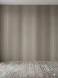 Textured wall paneling with a patterned rug on the floor