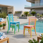 Colorful chairs by a pool with modern building and garden in the background
